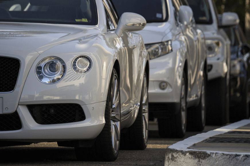 White vehicle outside the workshop